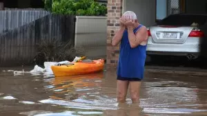 Homeowner upset and frustrated by the flood damage to his home