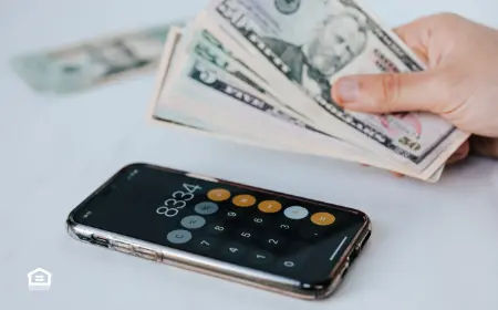 Calculating cash flow with cash in hand and smartphone calculator